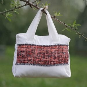Alt="Neceser de viaje naranja Cashmere elegante".