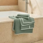 ALT="Toallas de secado rápido de algodón orgánico para baño."